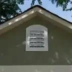 Installed Meridian 8 ft. x 10 ft. Wood Storage Shed with Autumn Brown Shingles - Image 4